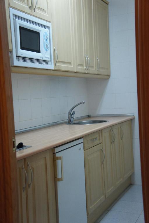 Apartamentos Fidalgo Sandiniés 객실 사진